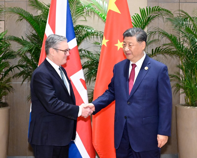 习近平会见英国首相斯塔莫1.jpg